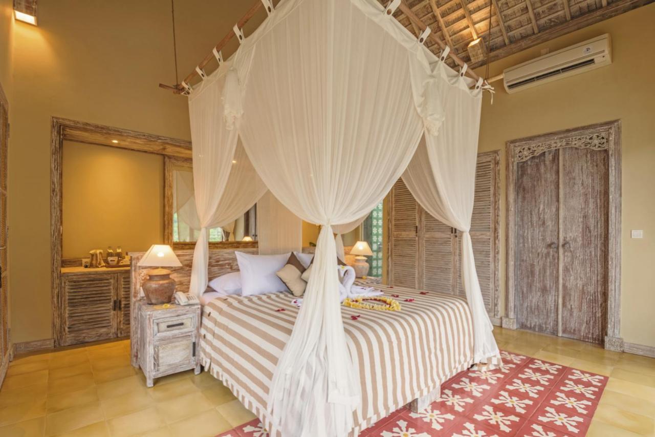 วาปา ดิ อูเม ซิเดเมน Hotel ซิเดอมัน ภายนอก รูปภาพ A bed with a mosquito net